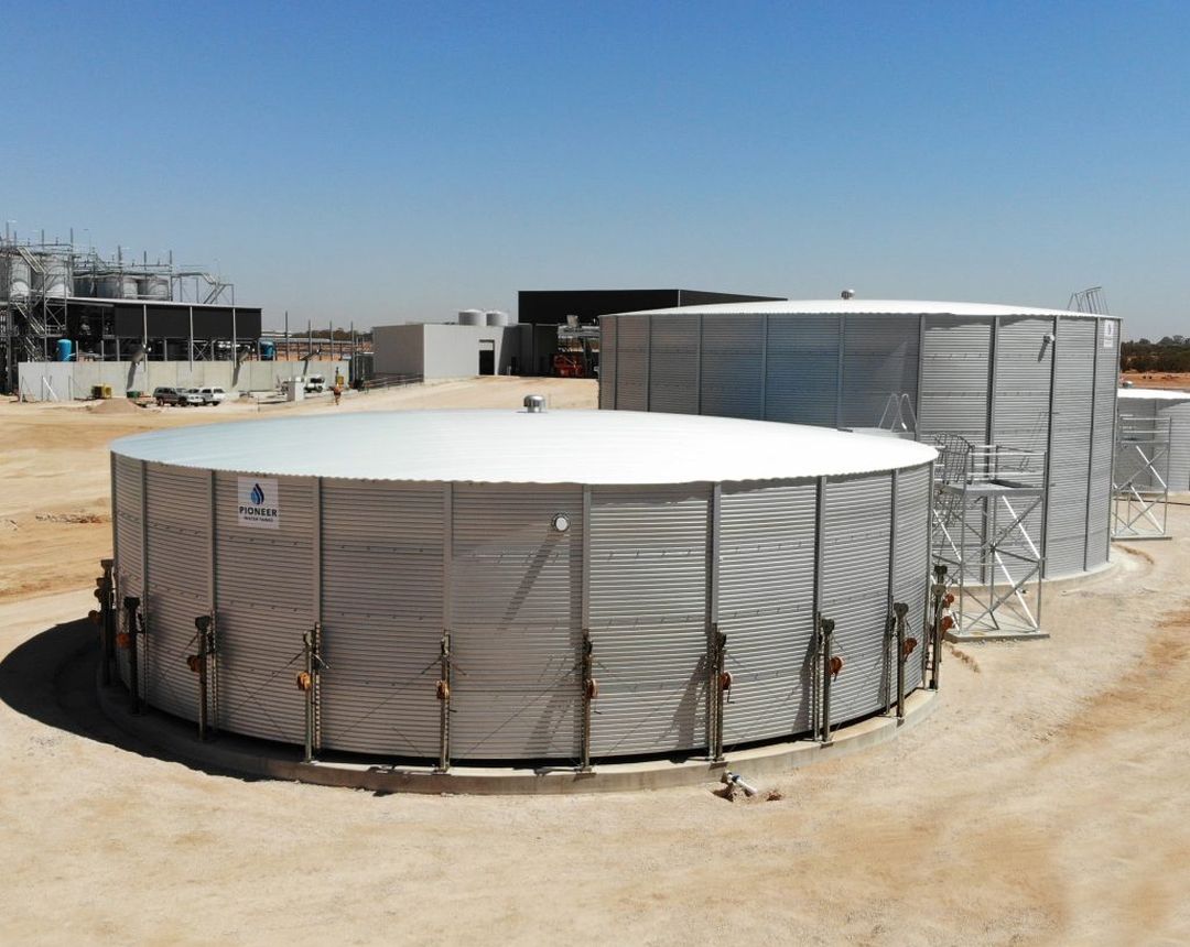 Large Pioneer tanks being built on a commercial site